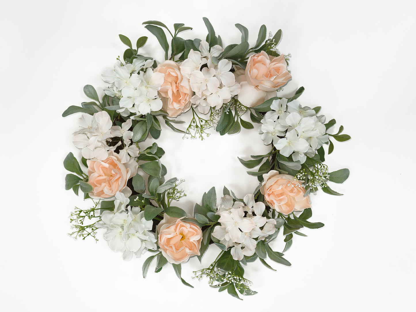 Artificial flower wreath