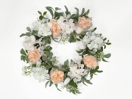 Artificial flower wreath